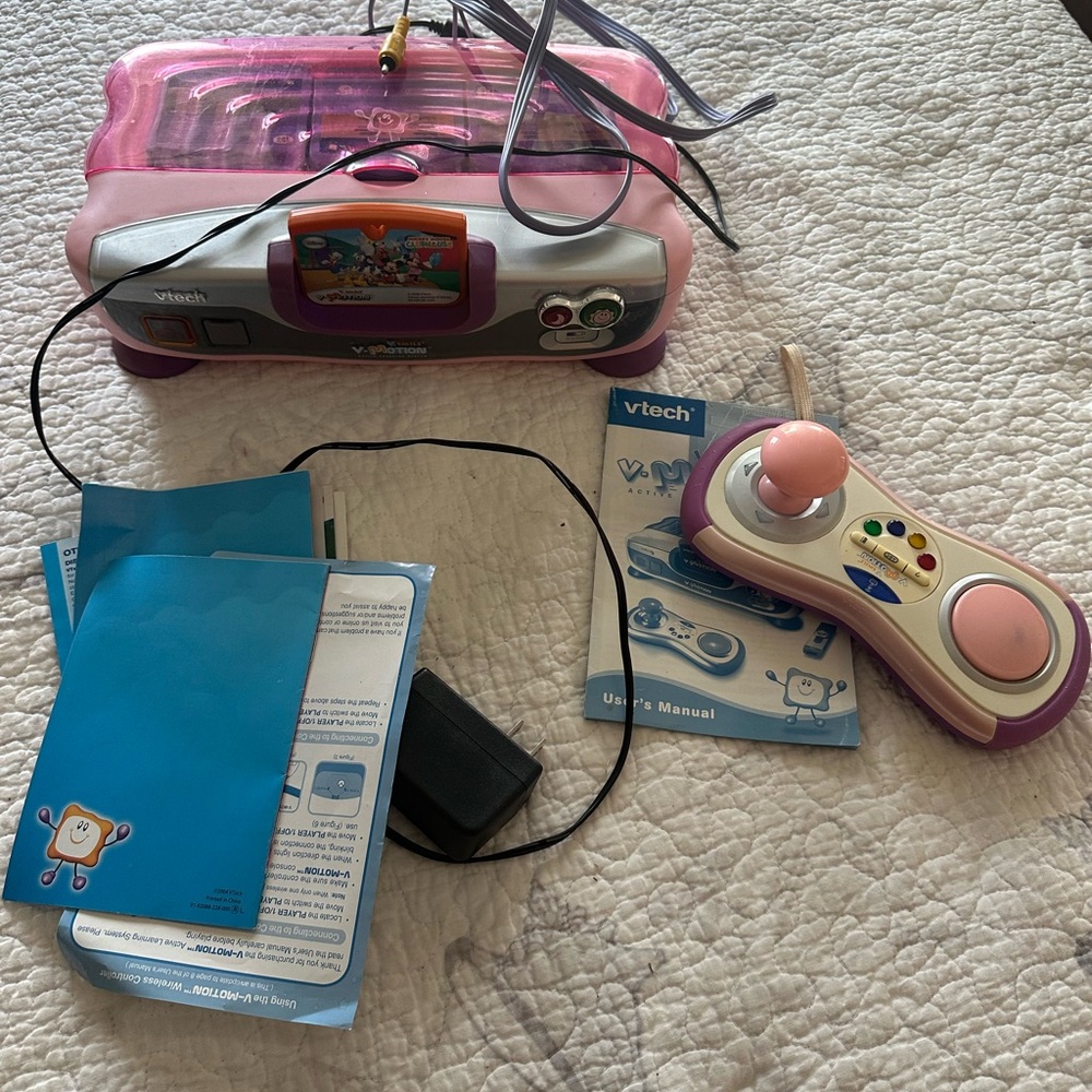 V Tech Smile V Motion game console, remote, and games